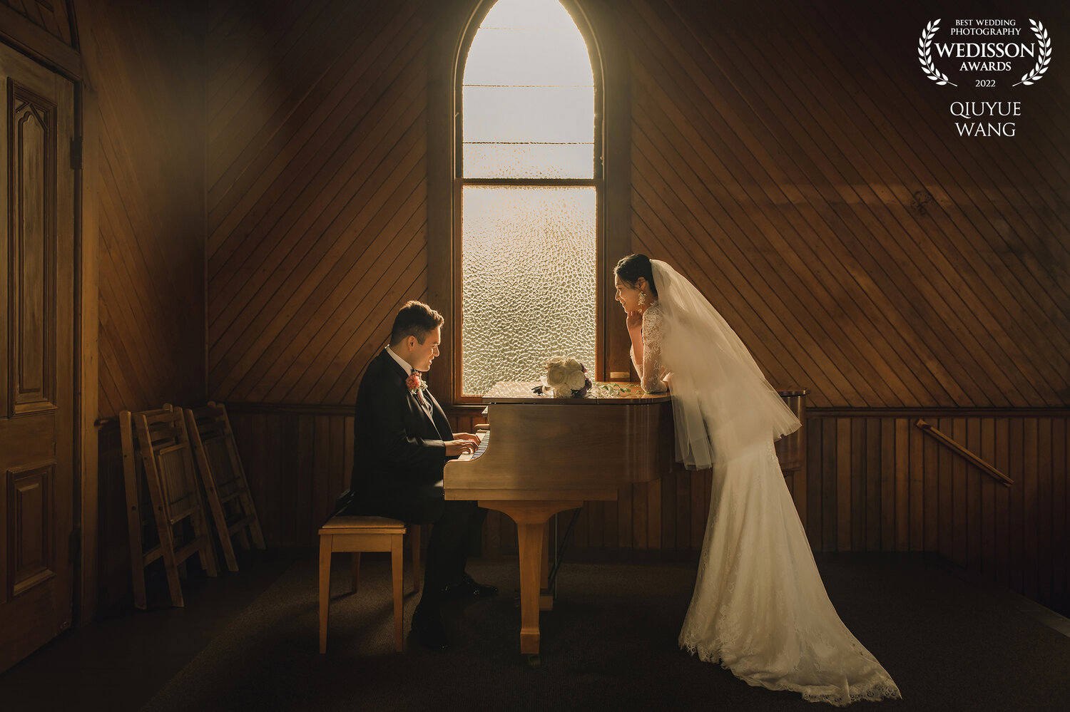 Wedisson award-winning piano room wedding photograph
