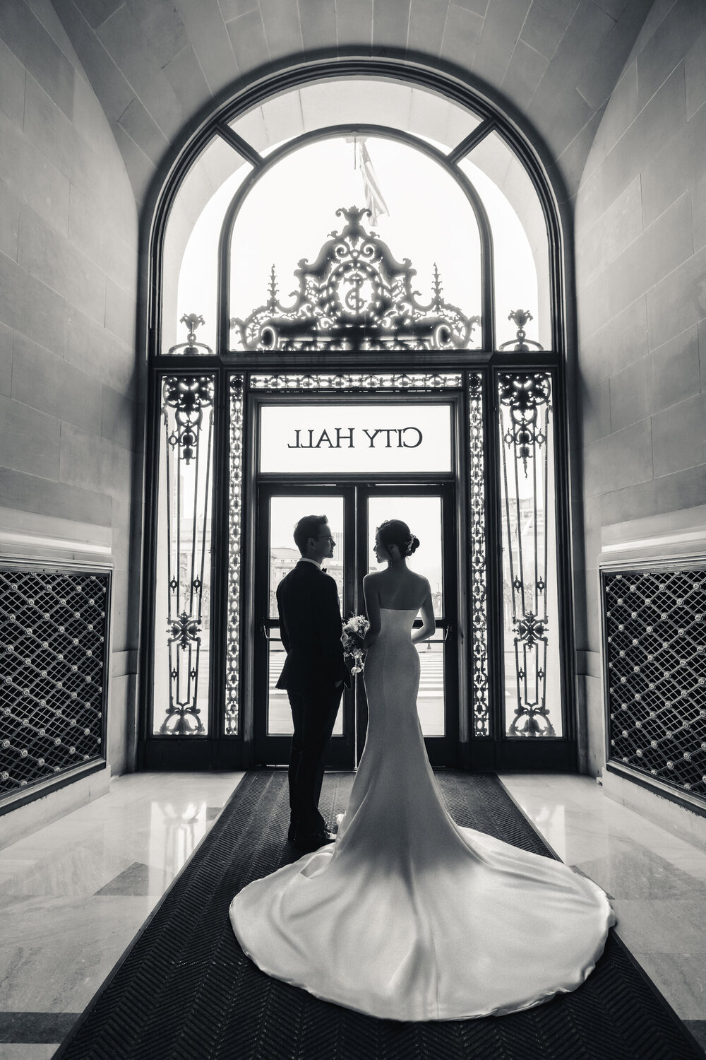 City Hall doorway silhouette wedding portrait