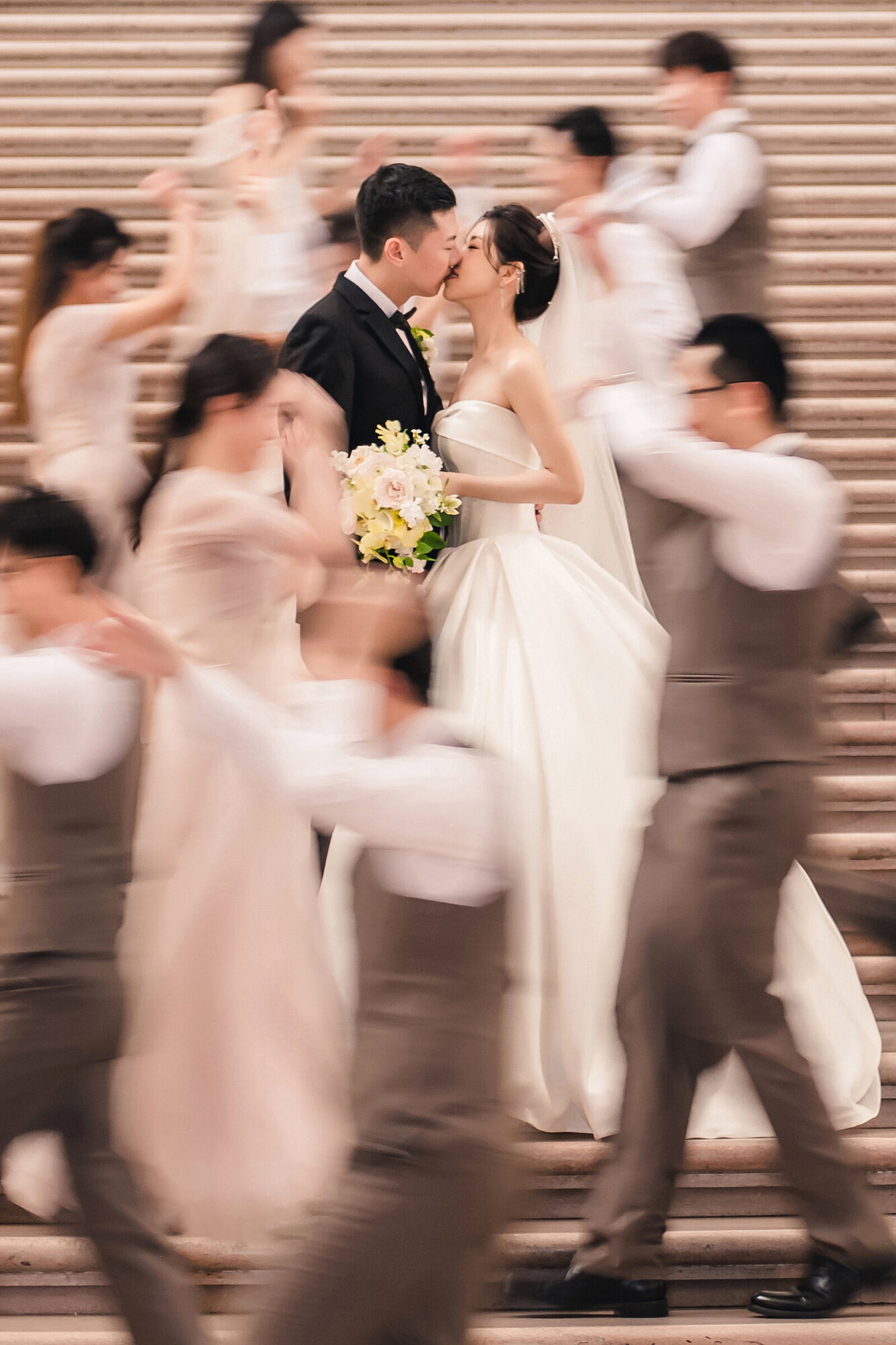 Motion blur wedding portrait with surrounding movement