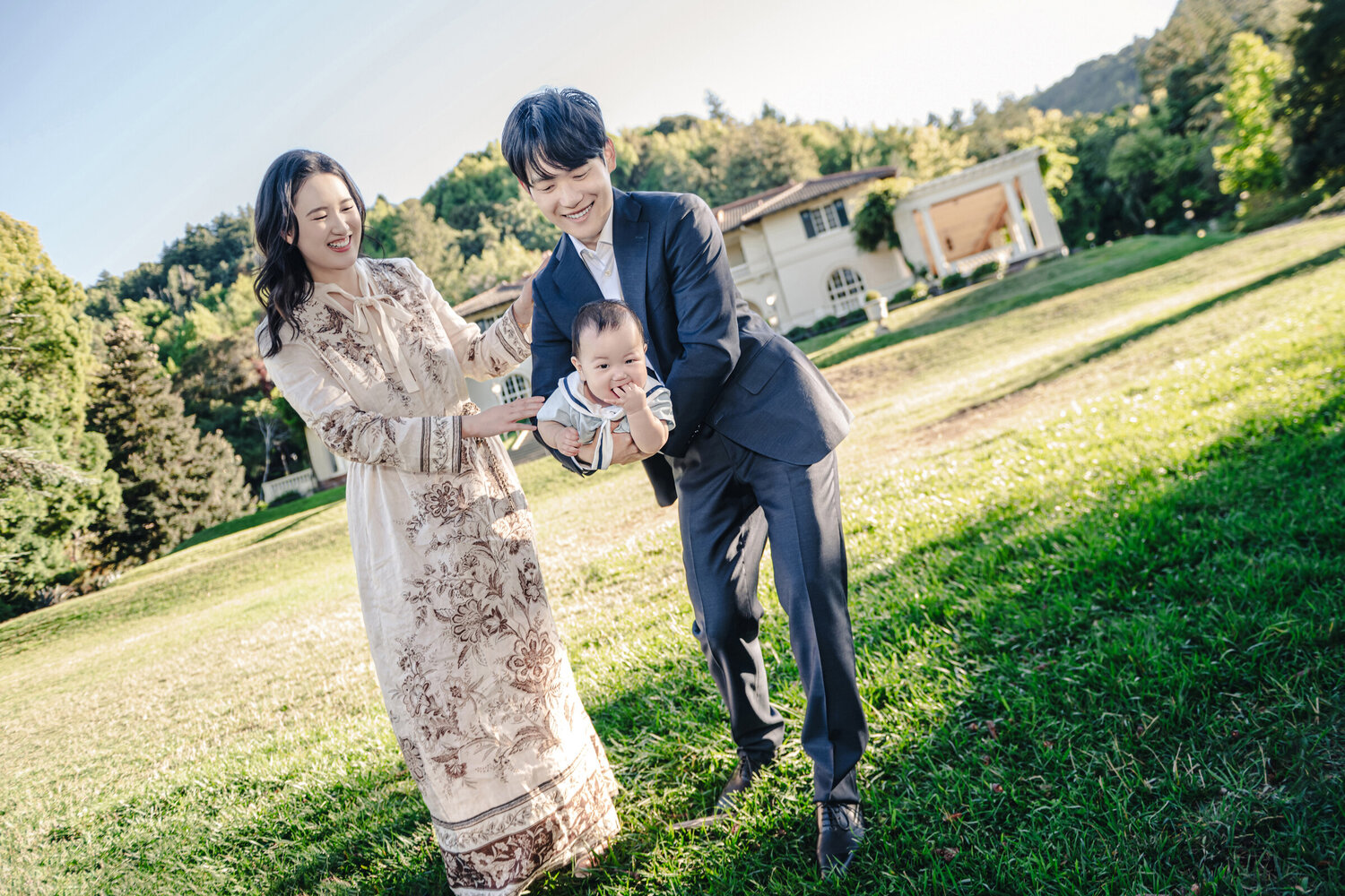 Relaxed family portrait on the lawn