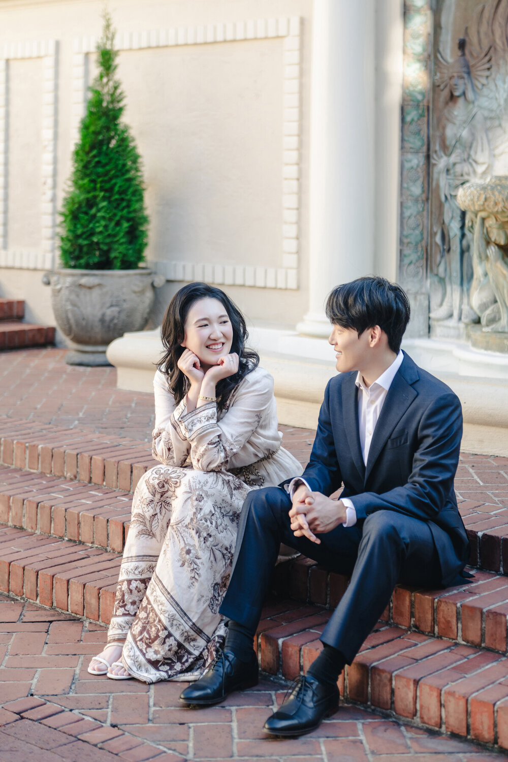 Seated parent portrait on brick steps