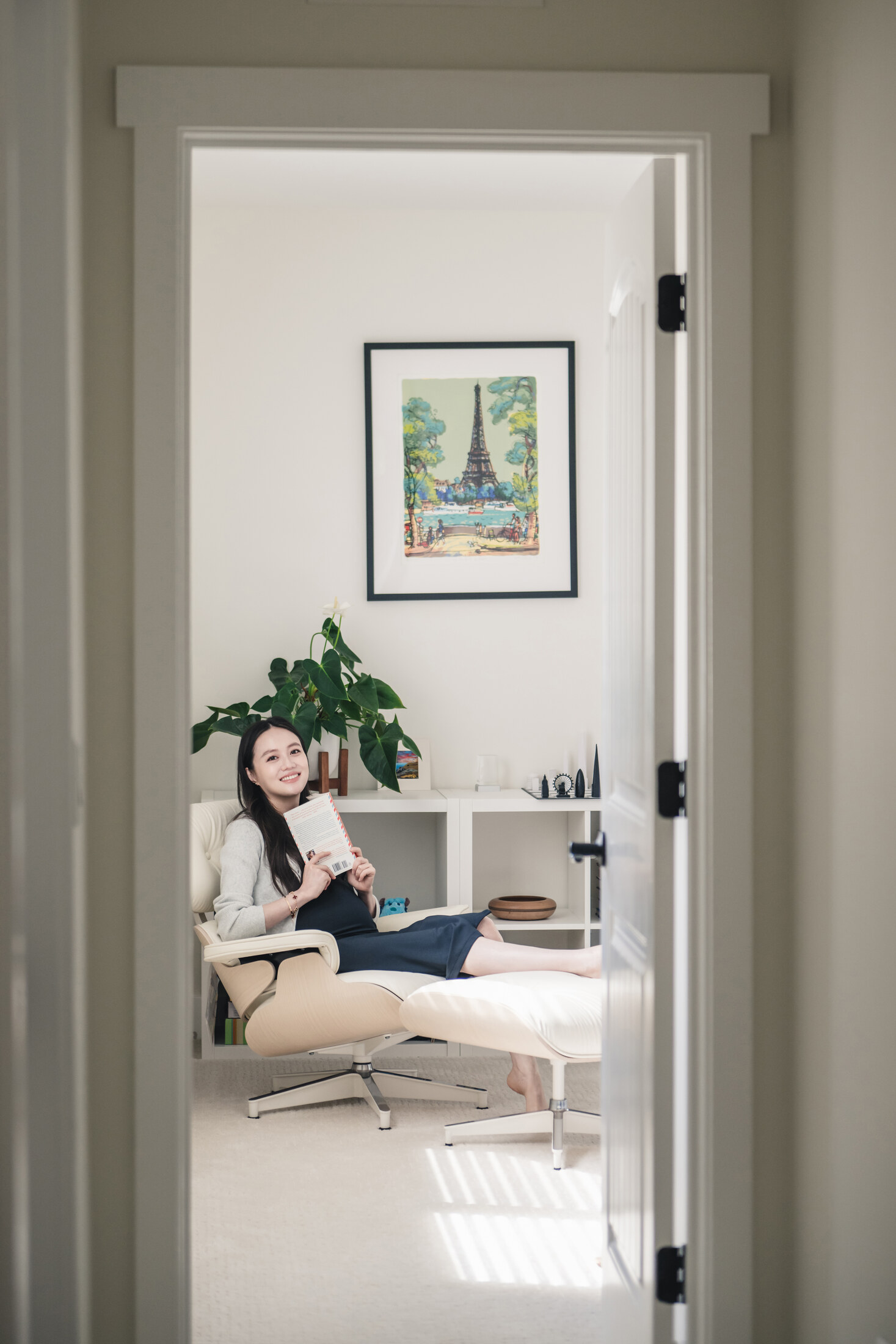 Vertical maternity portrait in quiet home light