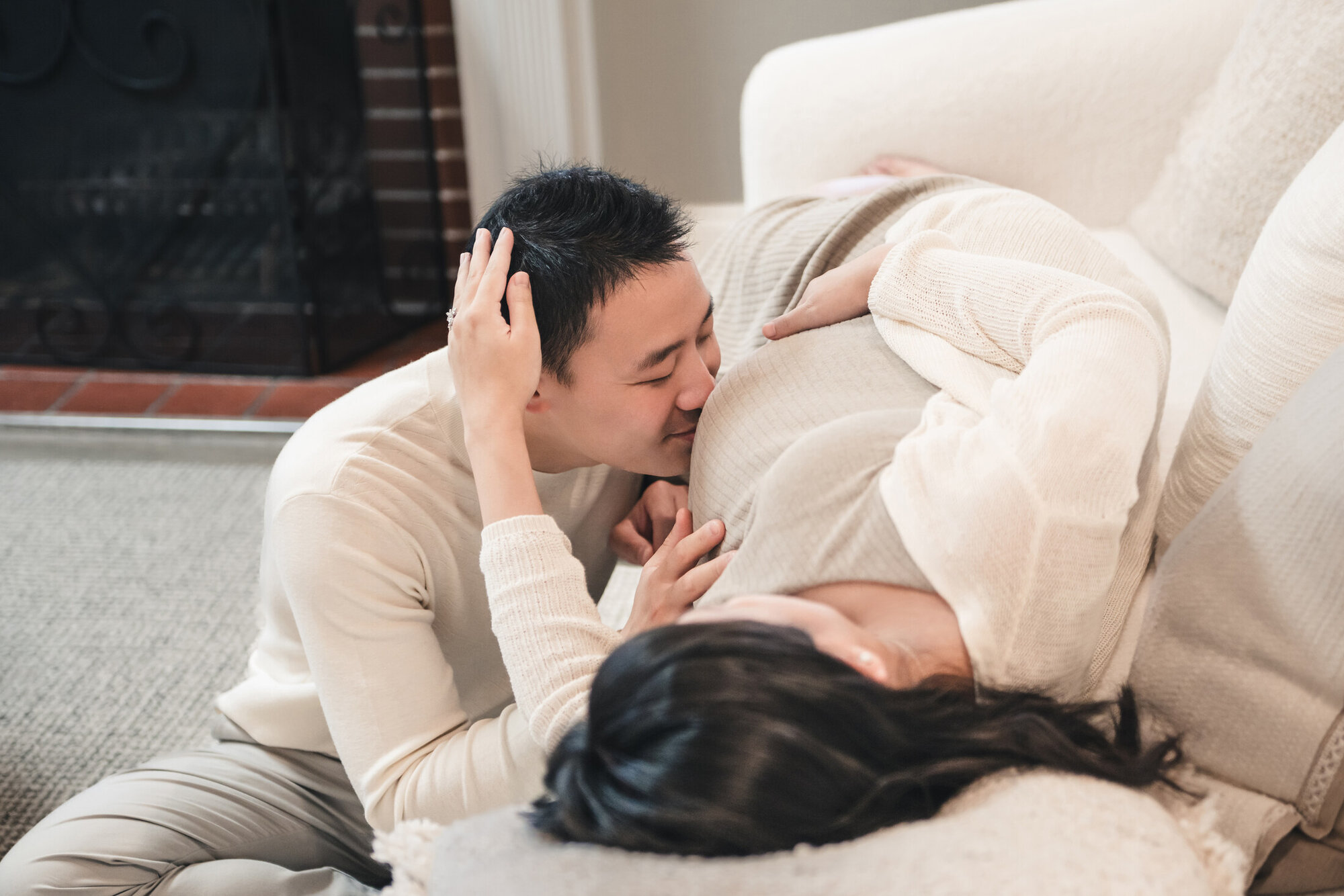 Intimate family maternity moment at home