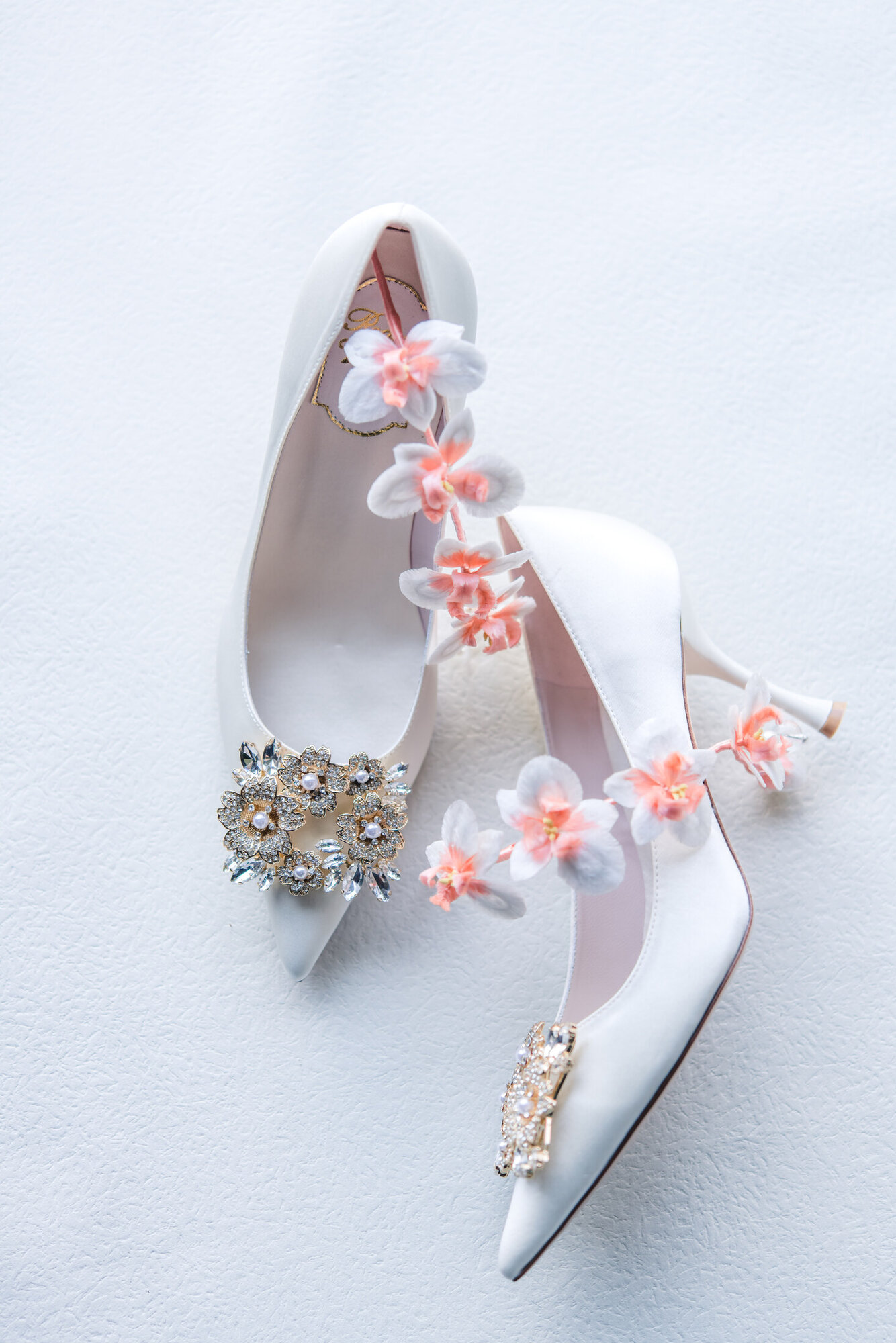 White bridal shoes with floral detail