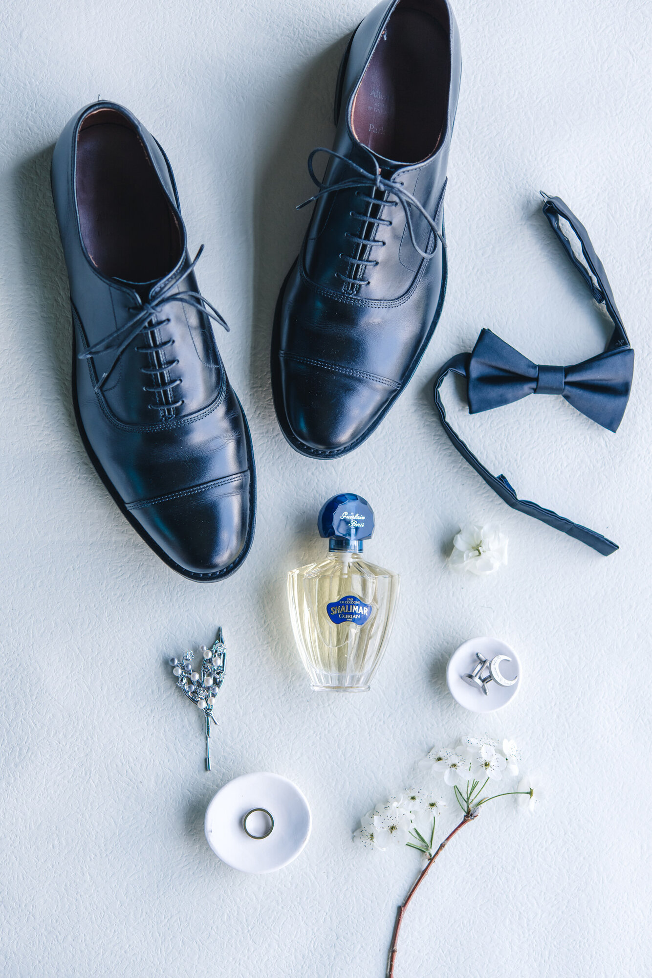 Groom shoes and bow tie details
