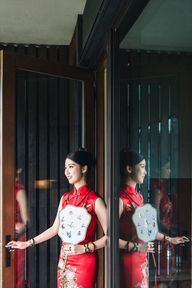 Bride in red with reflections