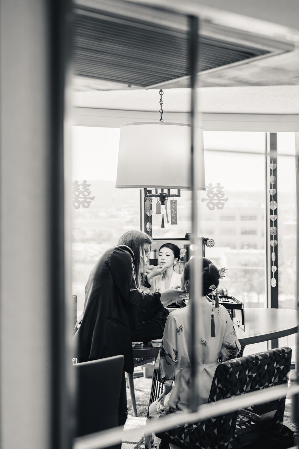 Black and white getting ready moment before a Chinese wedding