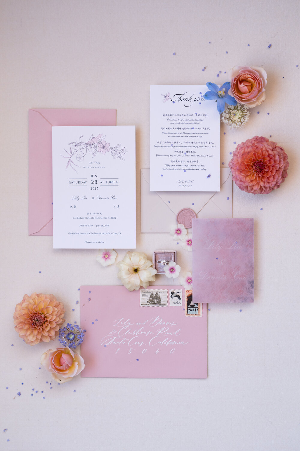 Pink wedding invitation suite with floral details