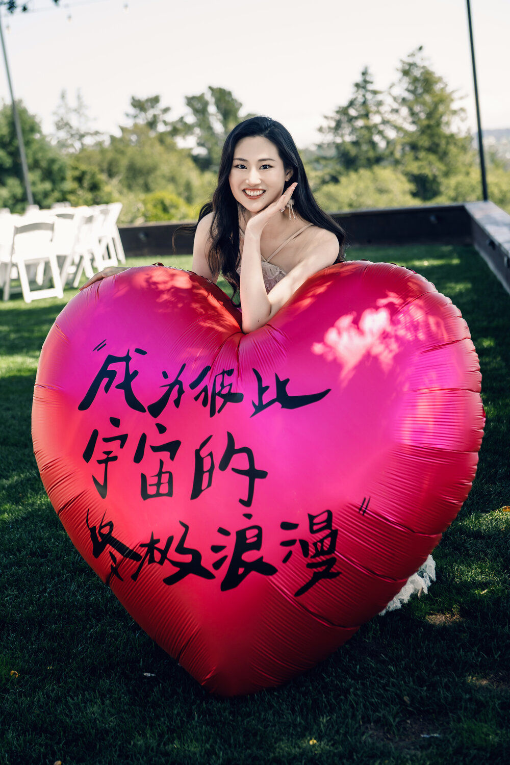 Bride with a red heart balloon