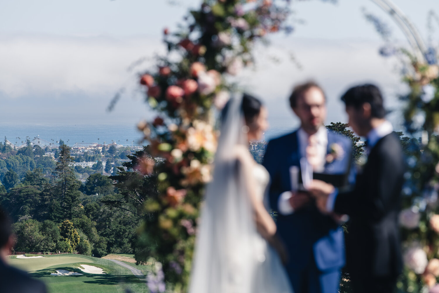 Soft focus ceremony moment with Santa Cruz hills
