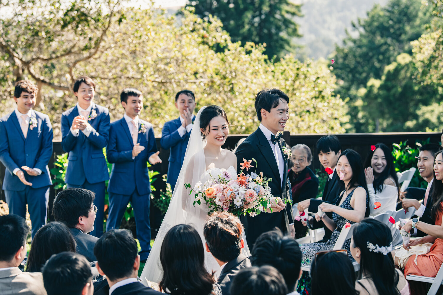 Lawn ceremony with guests and wedding party