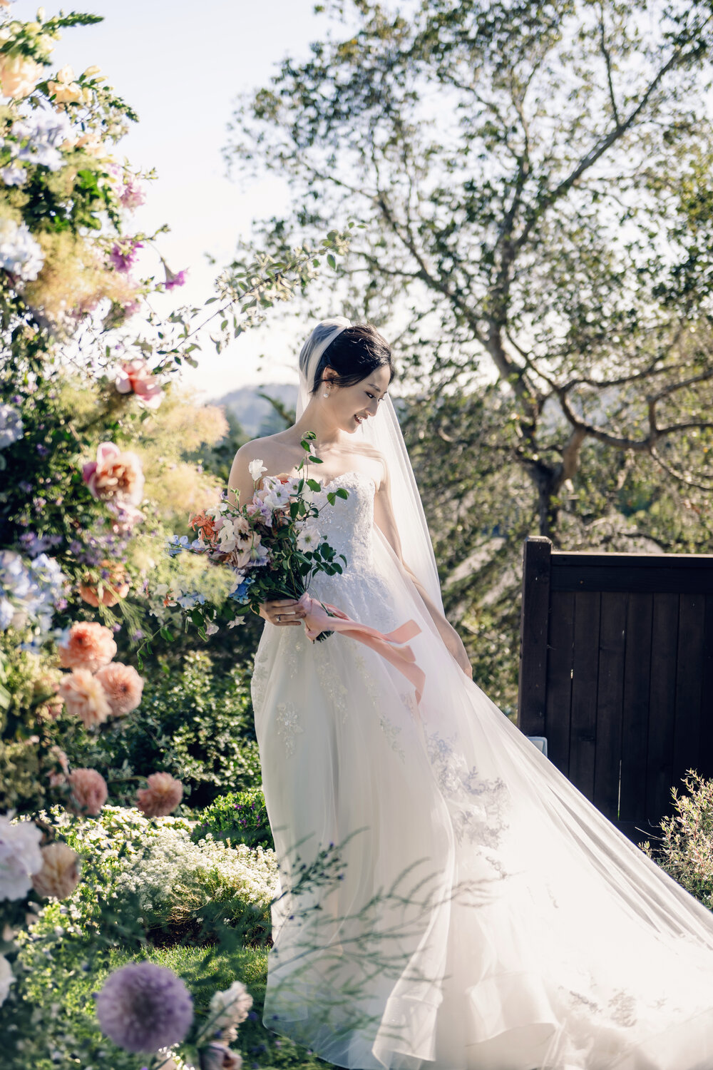 Bride portrait beside the ceremony arch