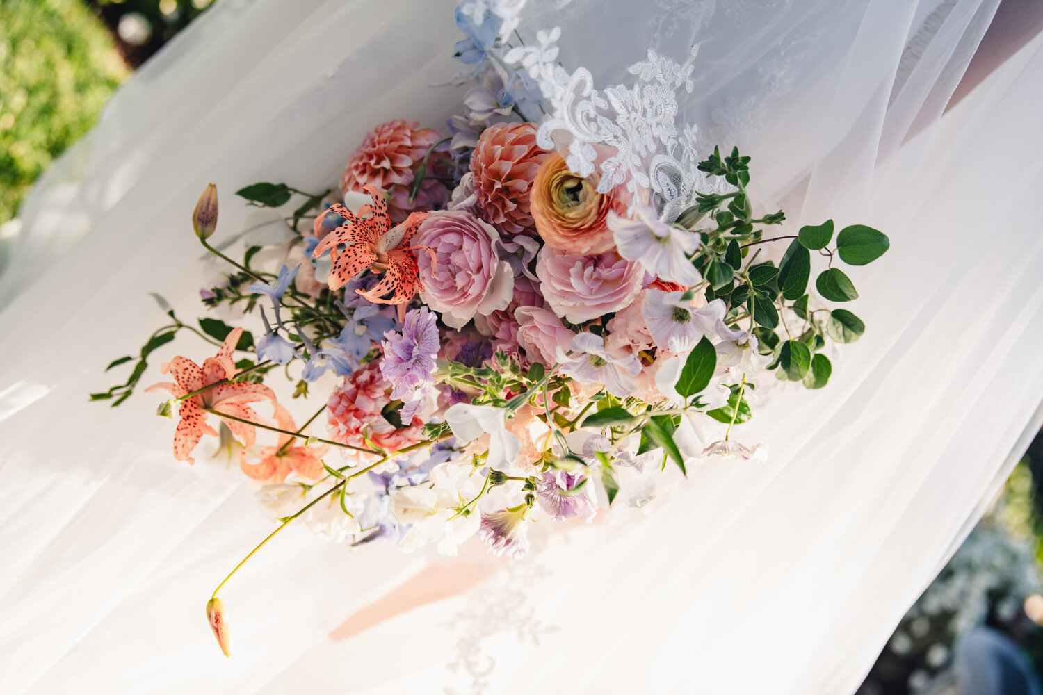 Bouquet and wedding dress detail