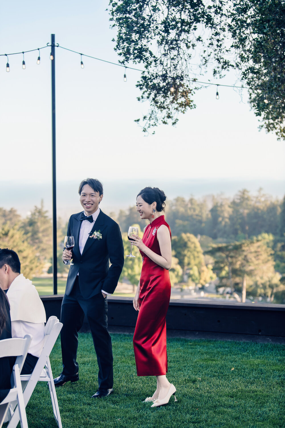 Couple walking on the lawn in red dress