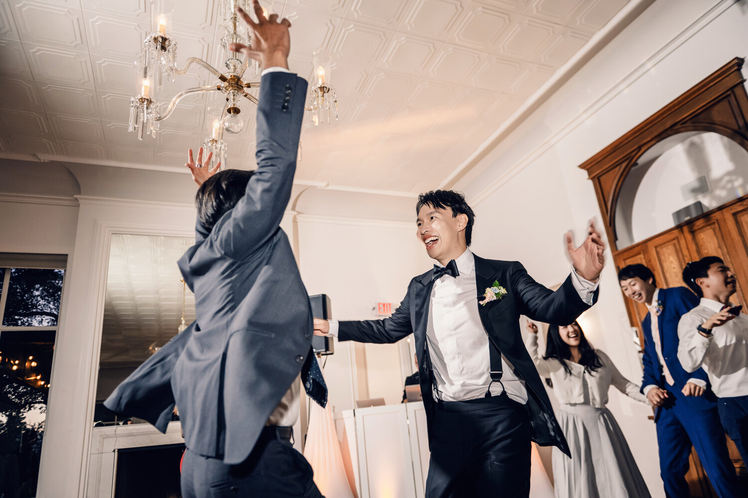Hands raised during the wedding party