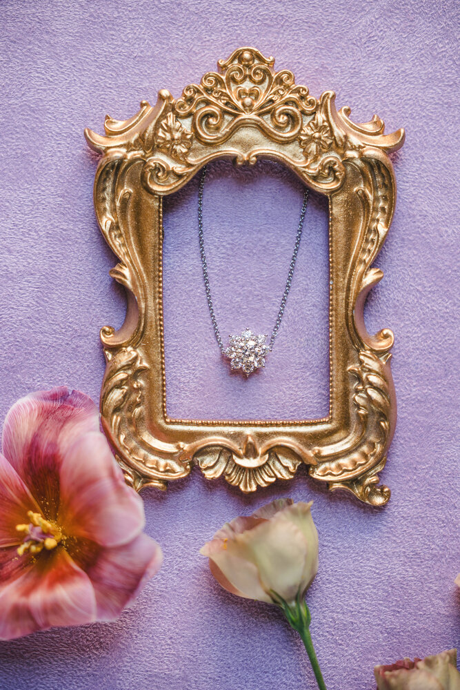 Necklace in a gold frame