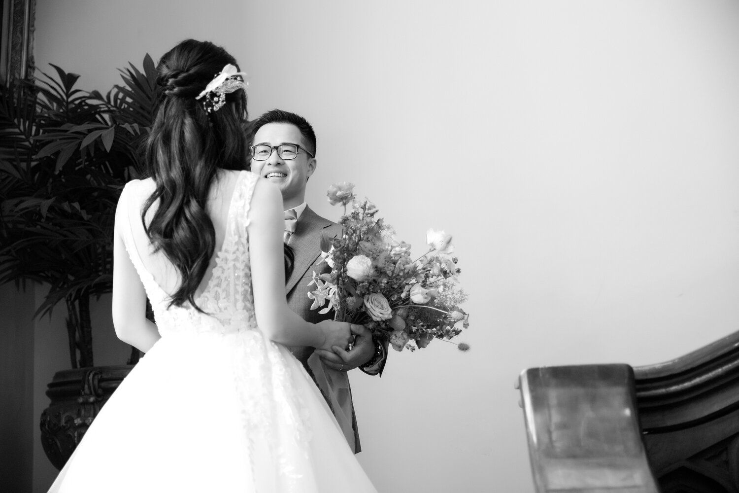 Black and white bridal laugh on the staircase