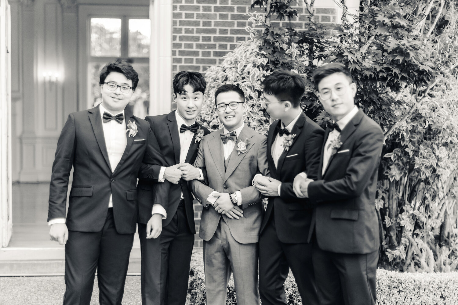 Black and white groomsmen portrait