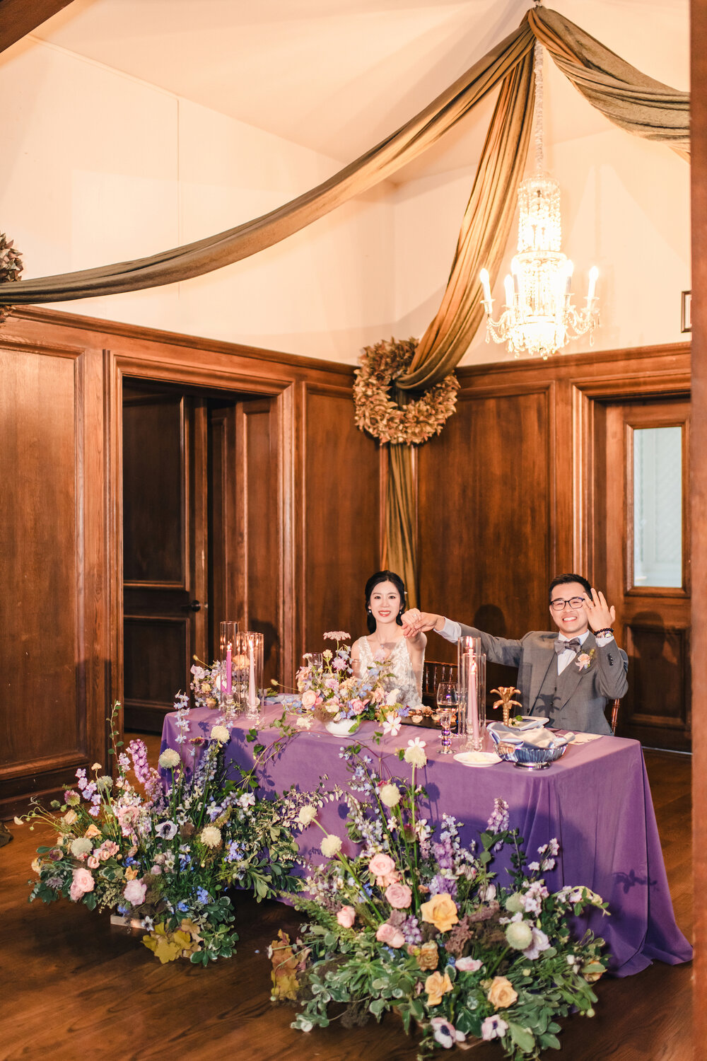Couple seated at the sweetheart table