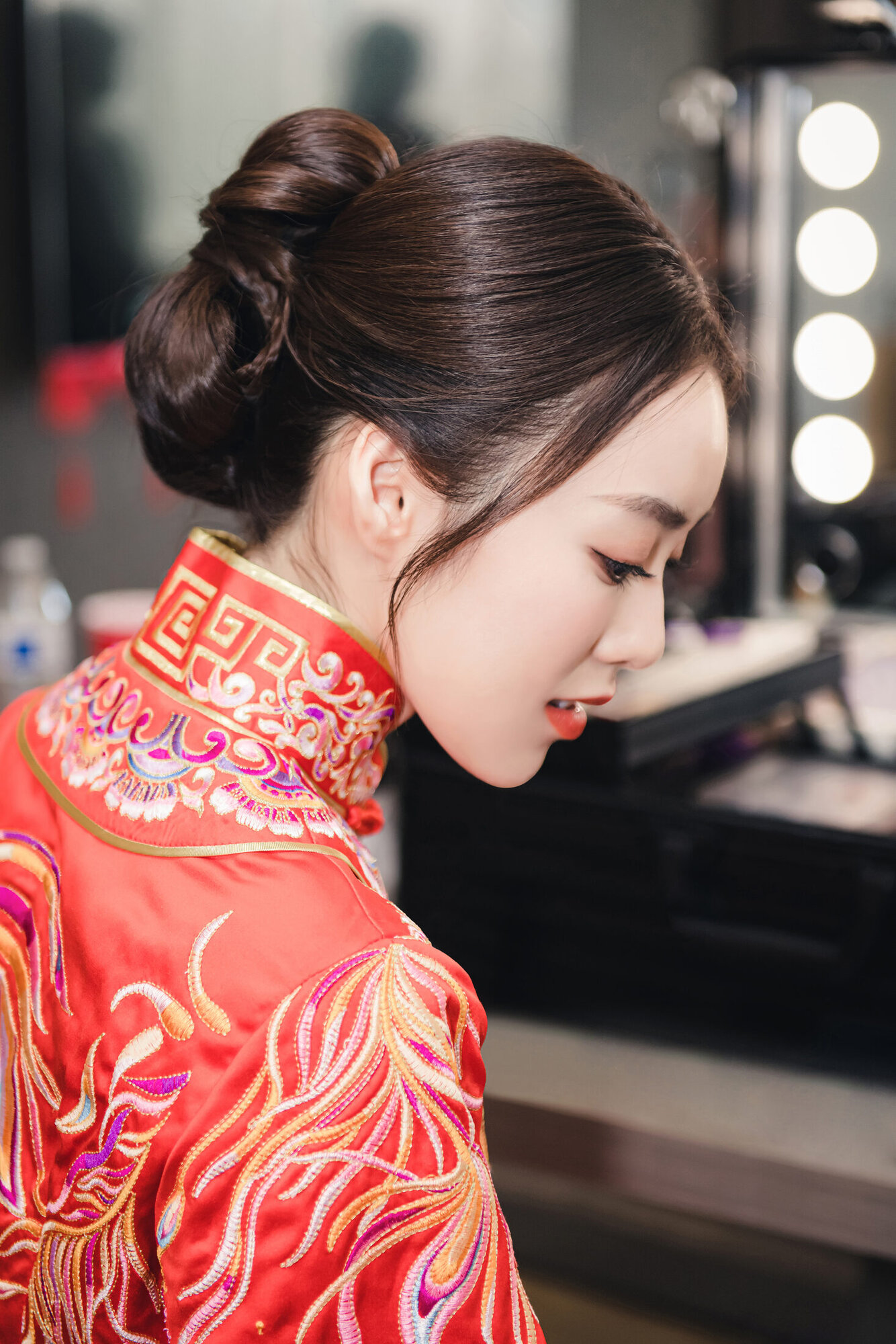Bride in red dress profile