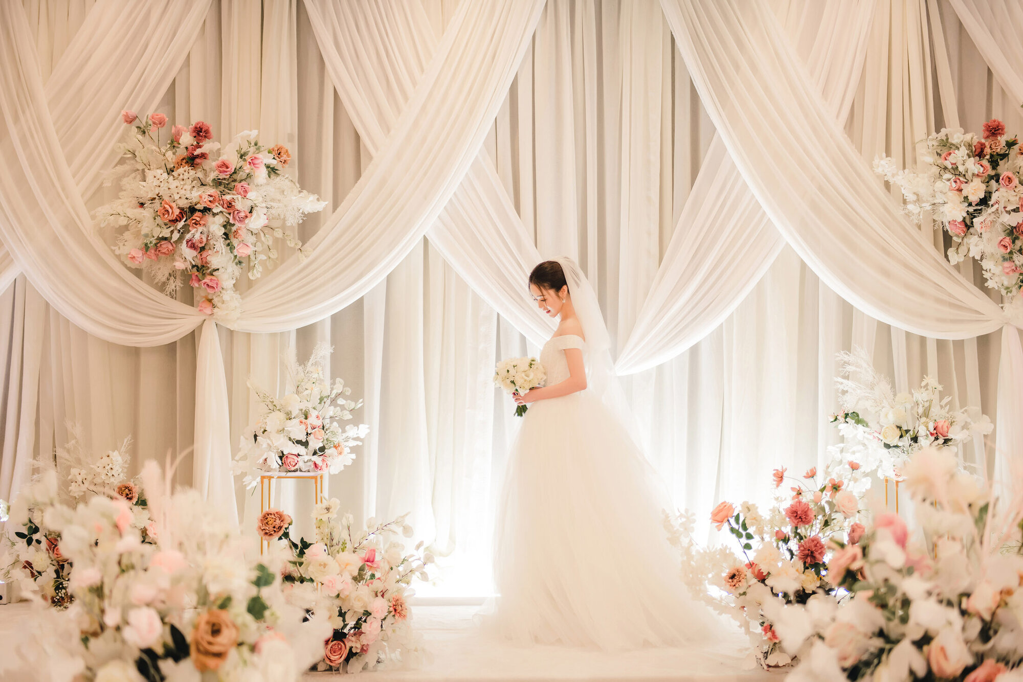Bride portrait at the ceremony flowers