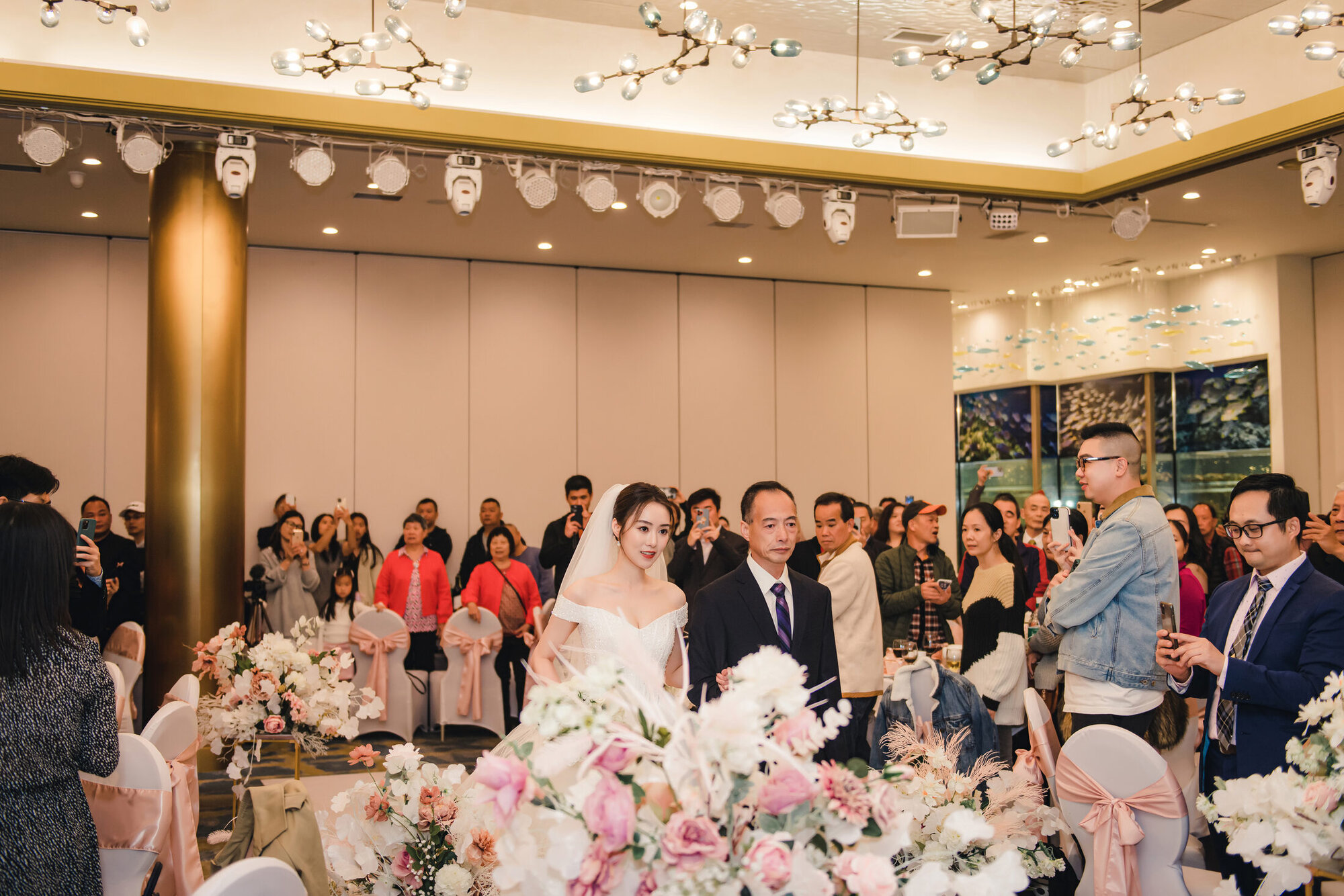 Bride walking down the aisle with her father