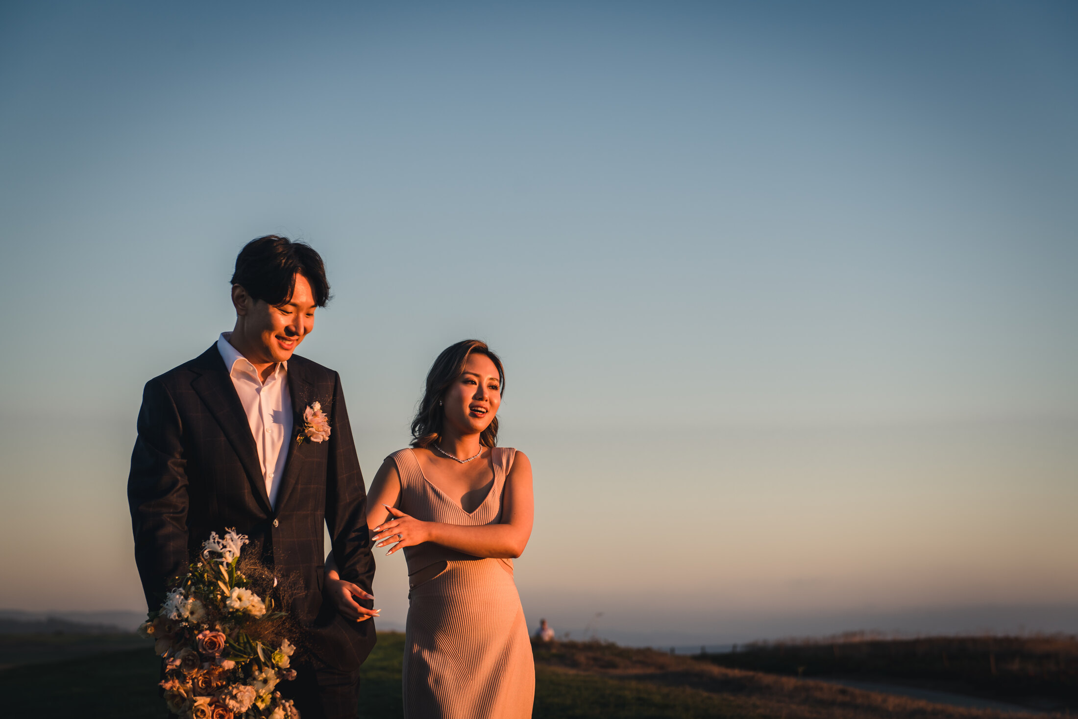 Couple walking in the sunset