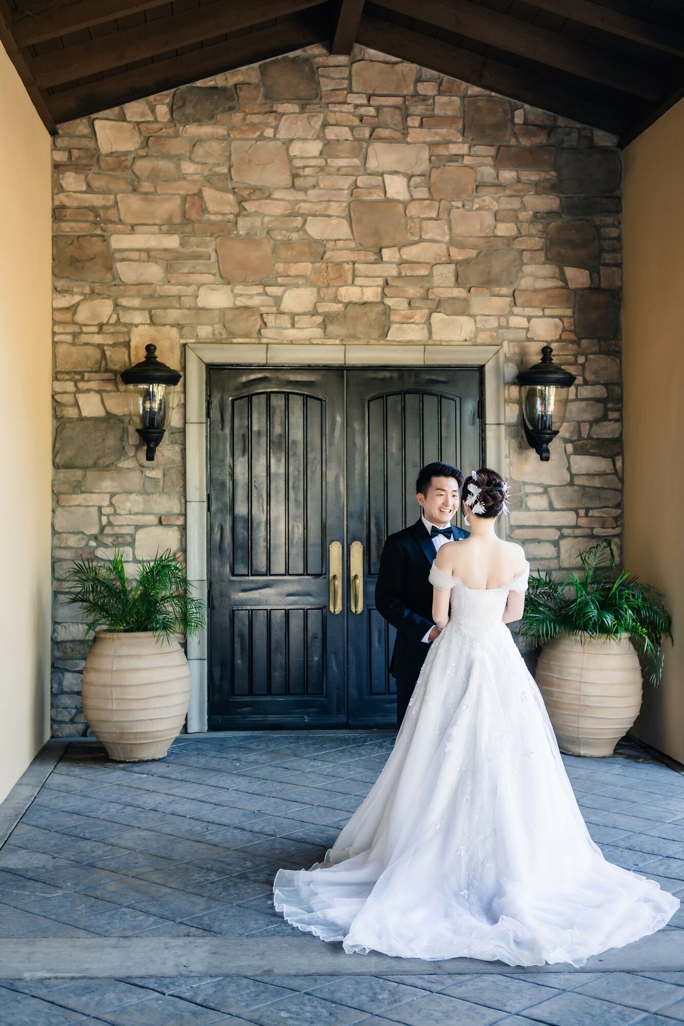Couple portrait by the doorway