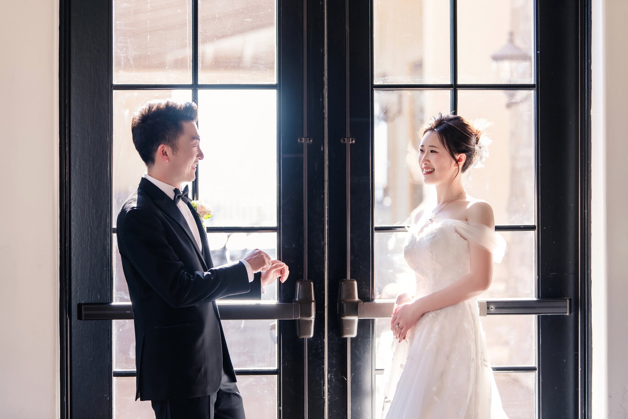 Couple in doorway light