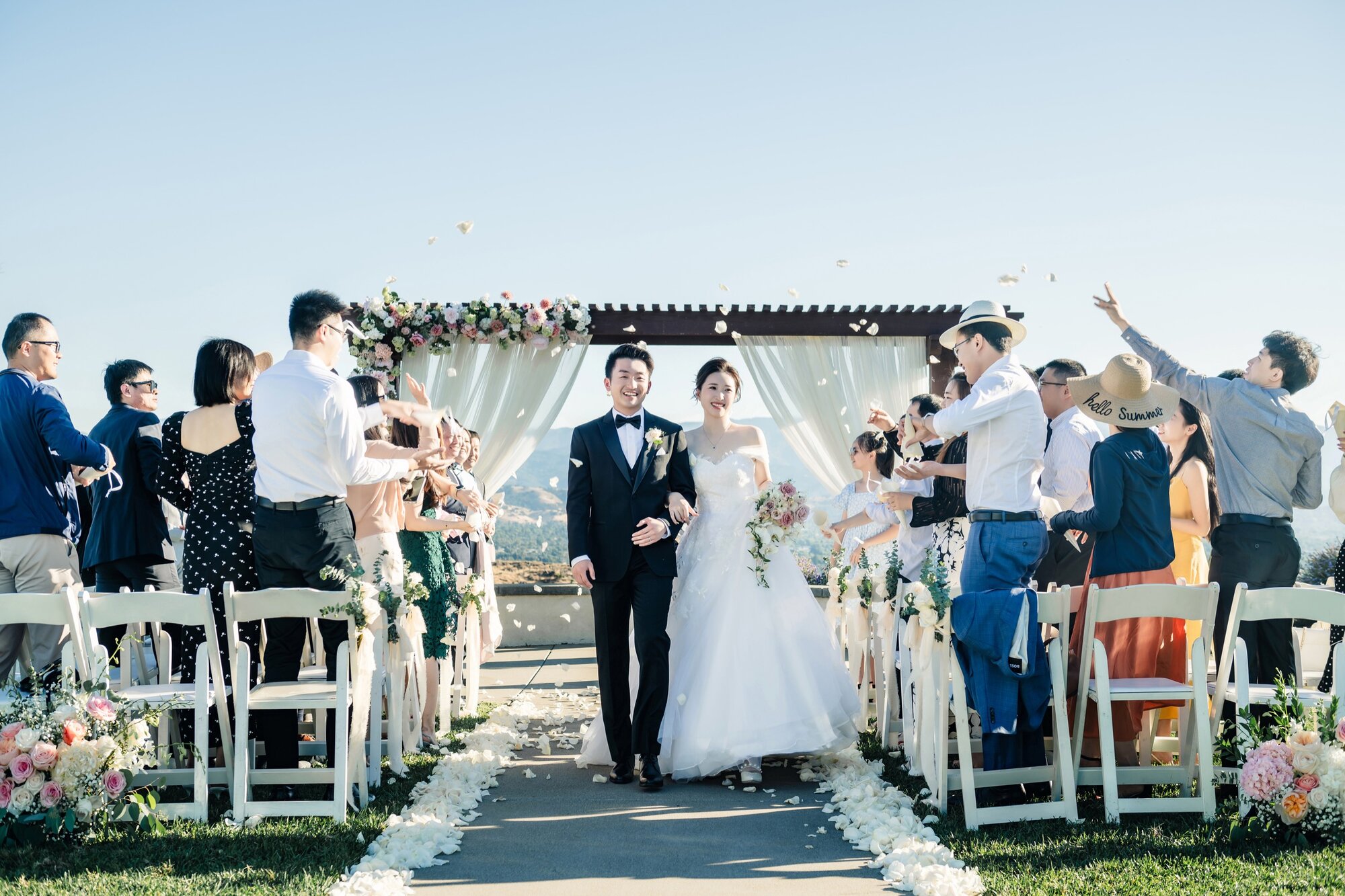 Couple recessional with petals