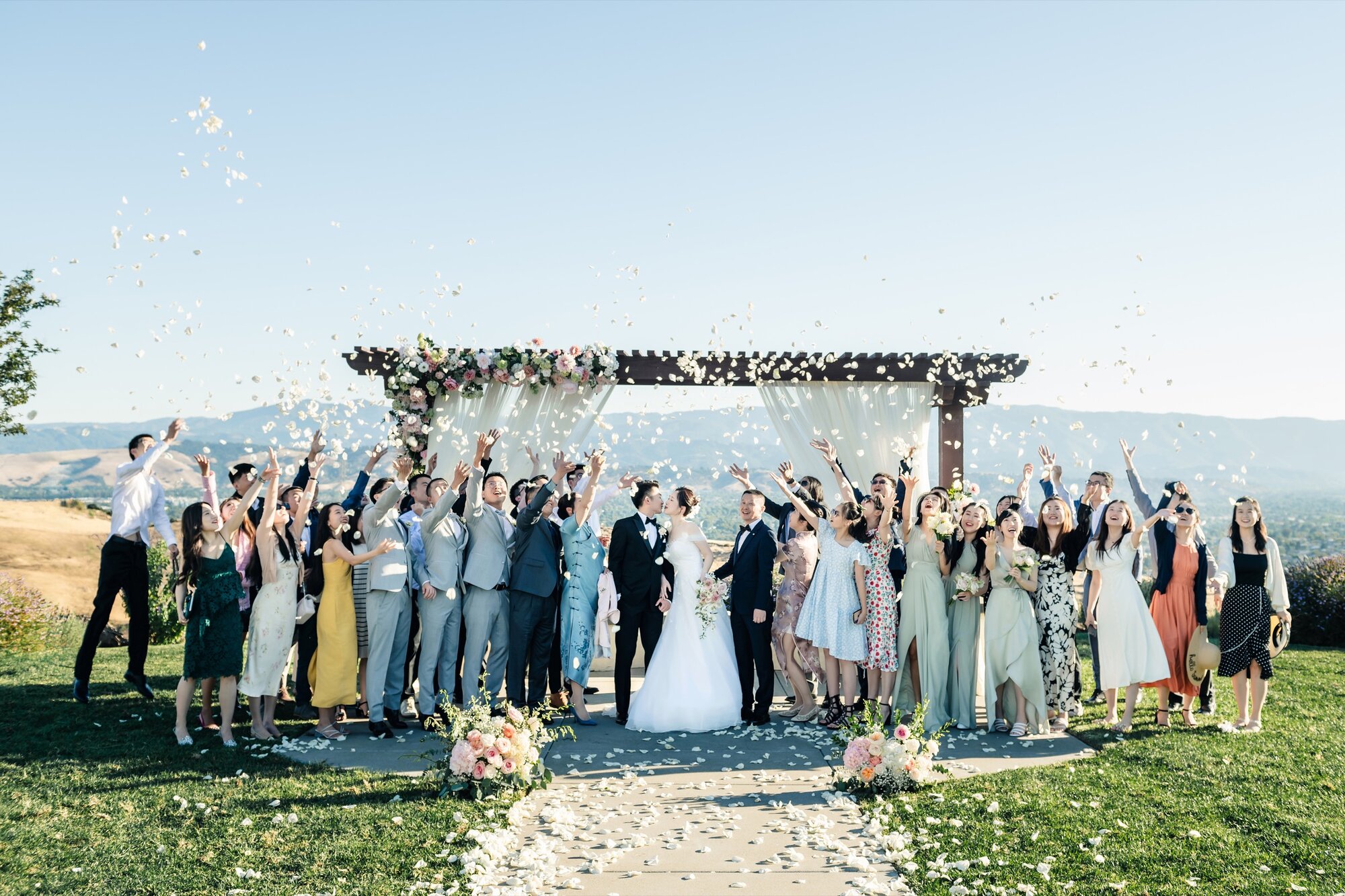 Wedding party at the floral arch