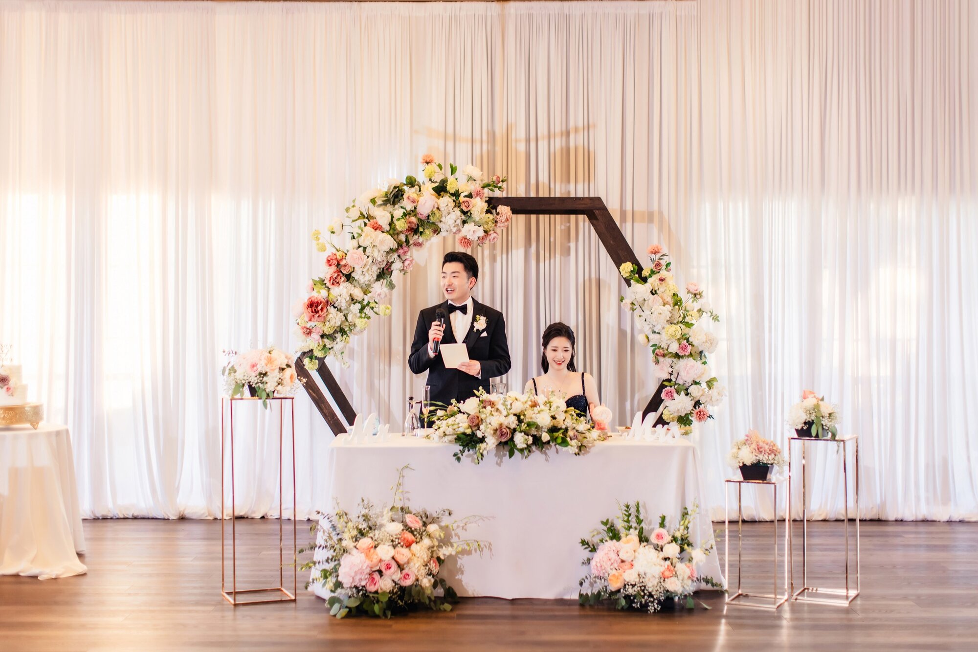 Reception head table and florals