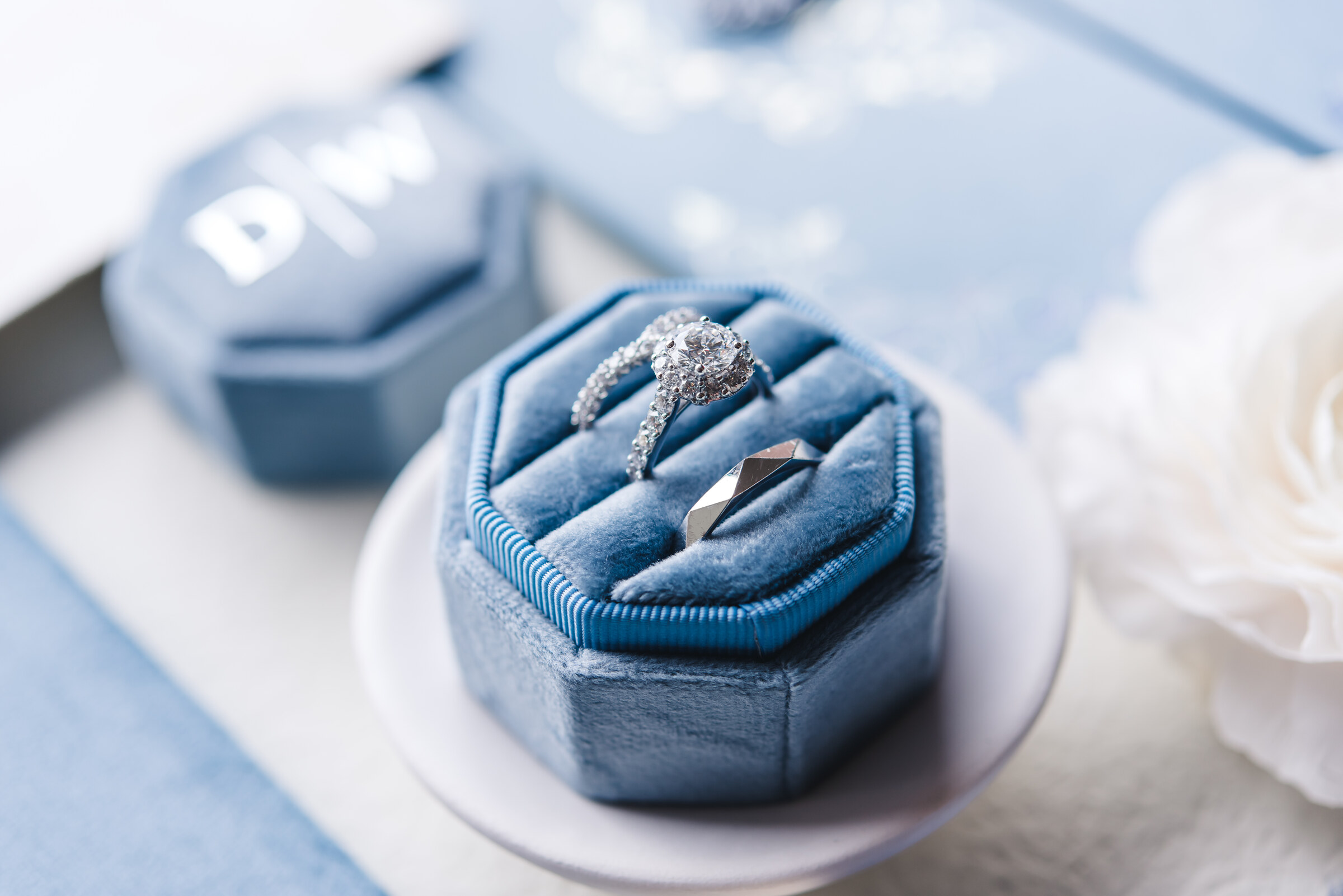 Wedding rings in a blue ring box