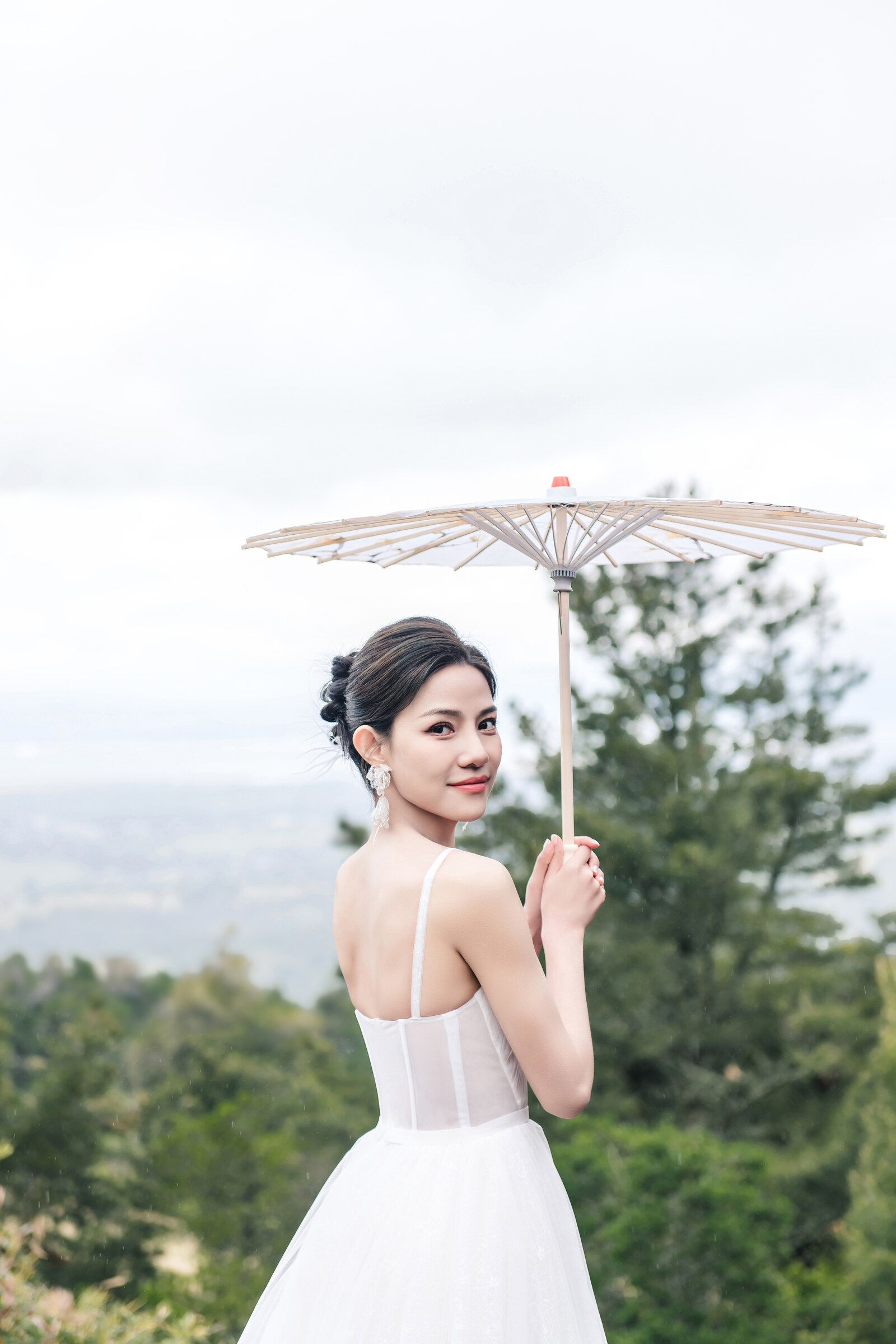 Black and white bridal portrait by the window