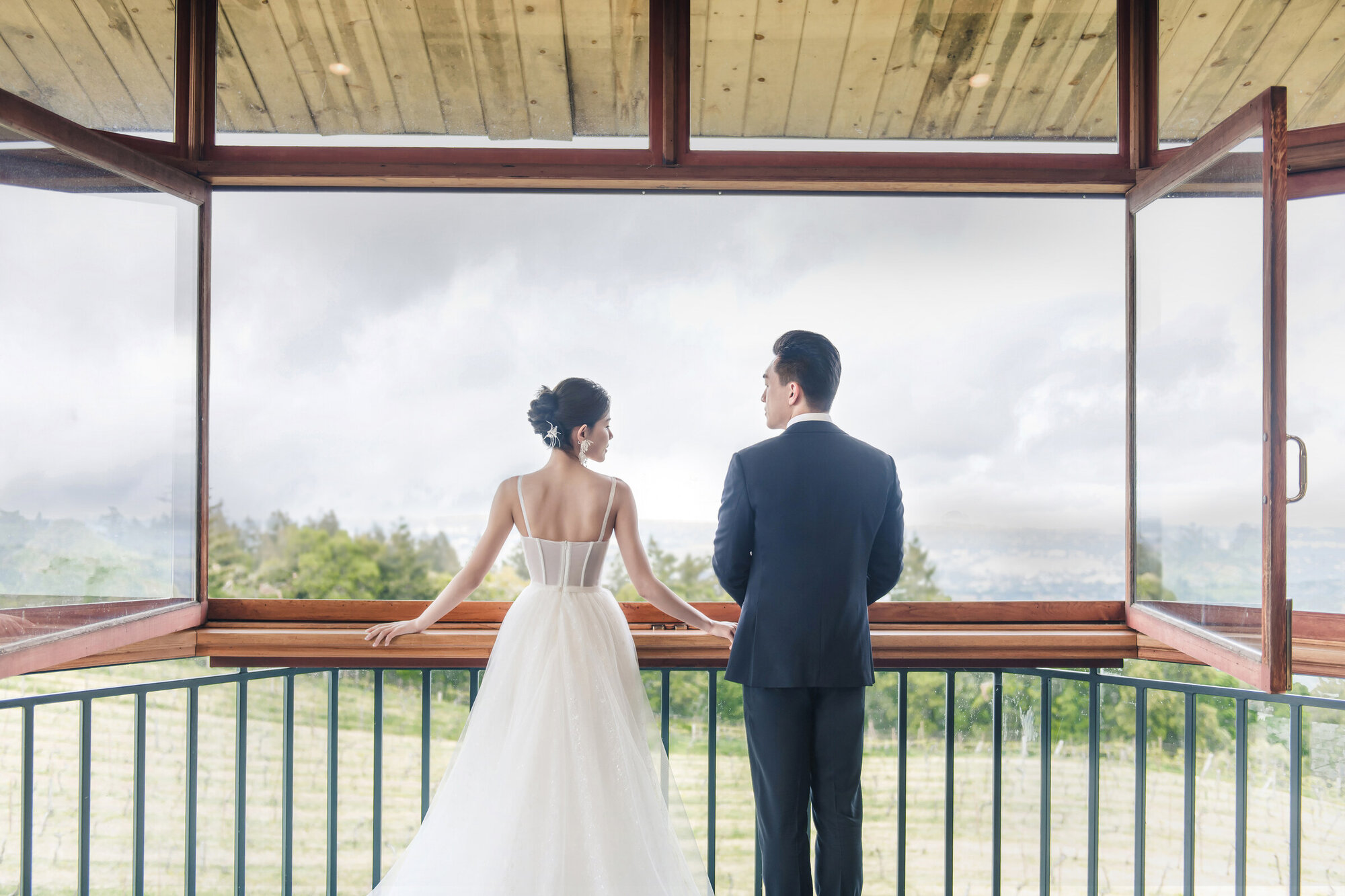 Couple portrait with hillside view