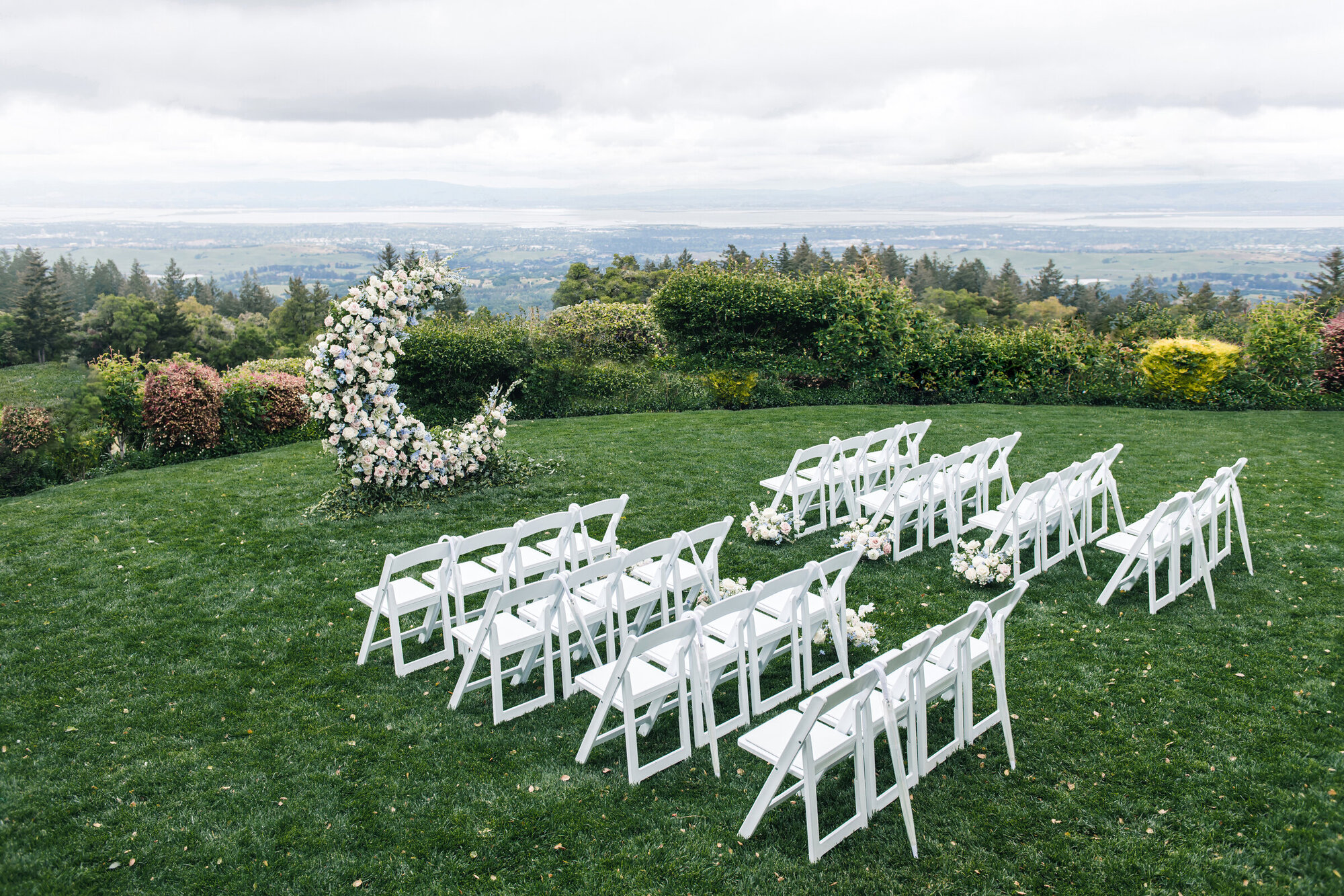Outdoor ceremony setup with mountain views