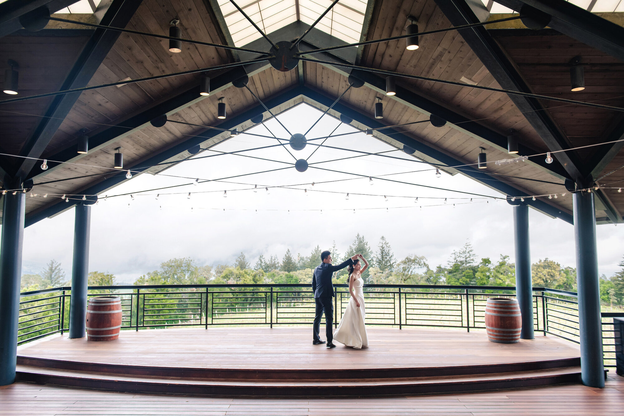 Couple kissing under the covered terrace