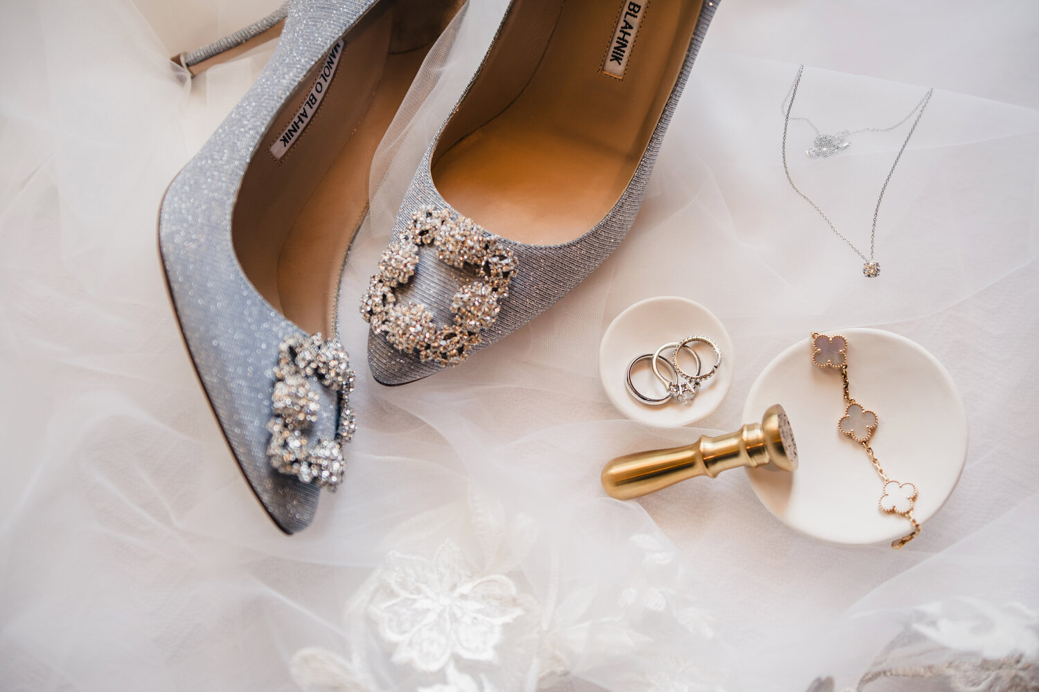Wedding shoes, rings, and jewelry details