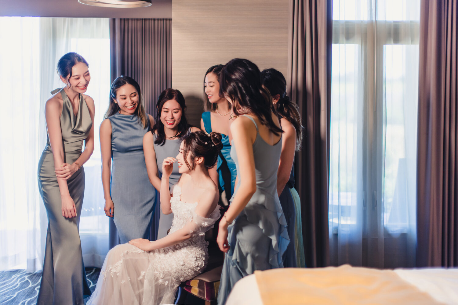 Bride and bridesmaids getting ready in the room