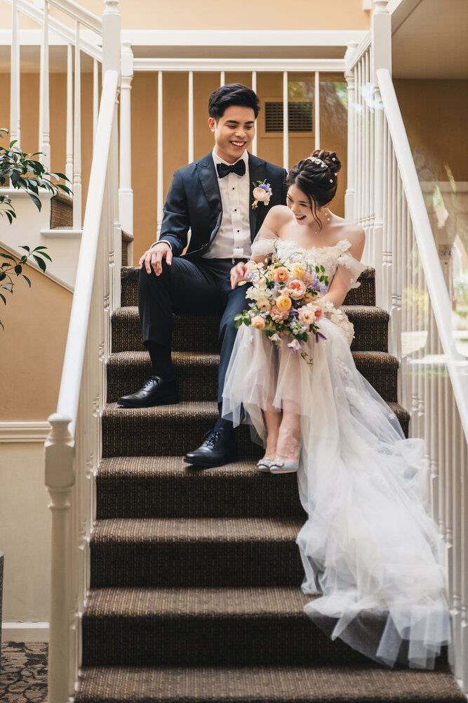 Bride and groom portrait on the stairs