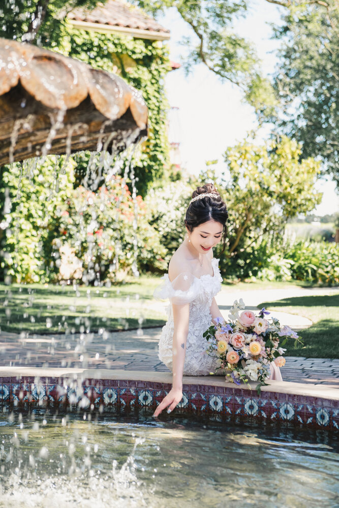Bride by the fountain