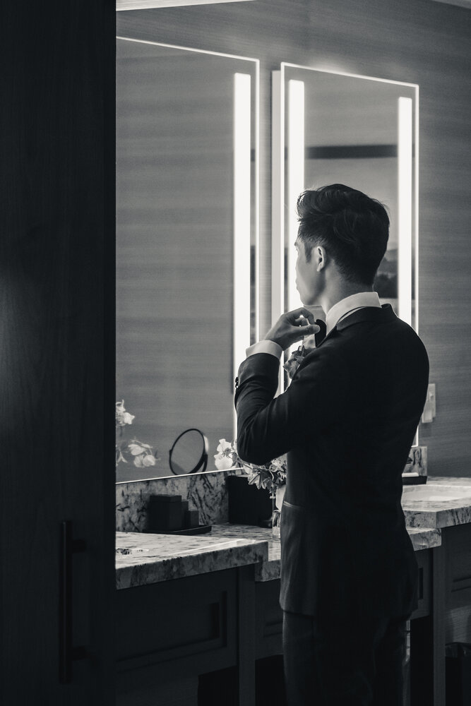 Black and white groom portrait before the ceremony