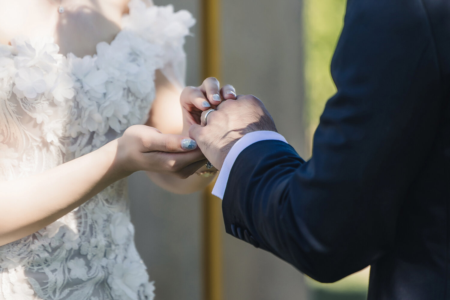 Ring exchange hands during the ceremony