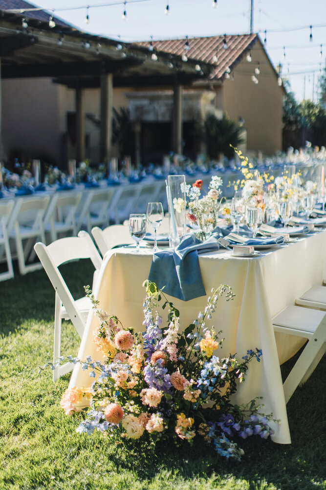 Outdoor reception table with blue linens