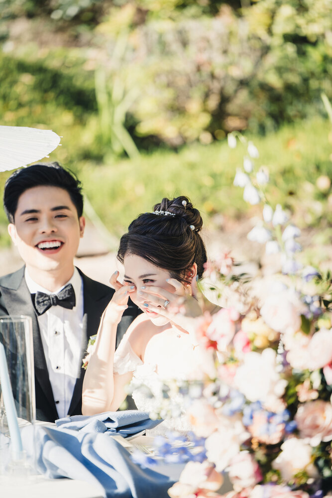Couple laughing at the dinner table