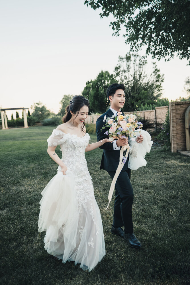 Couple walking in the evening garden