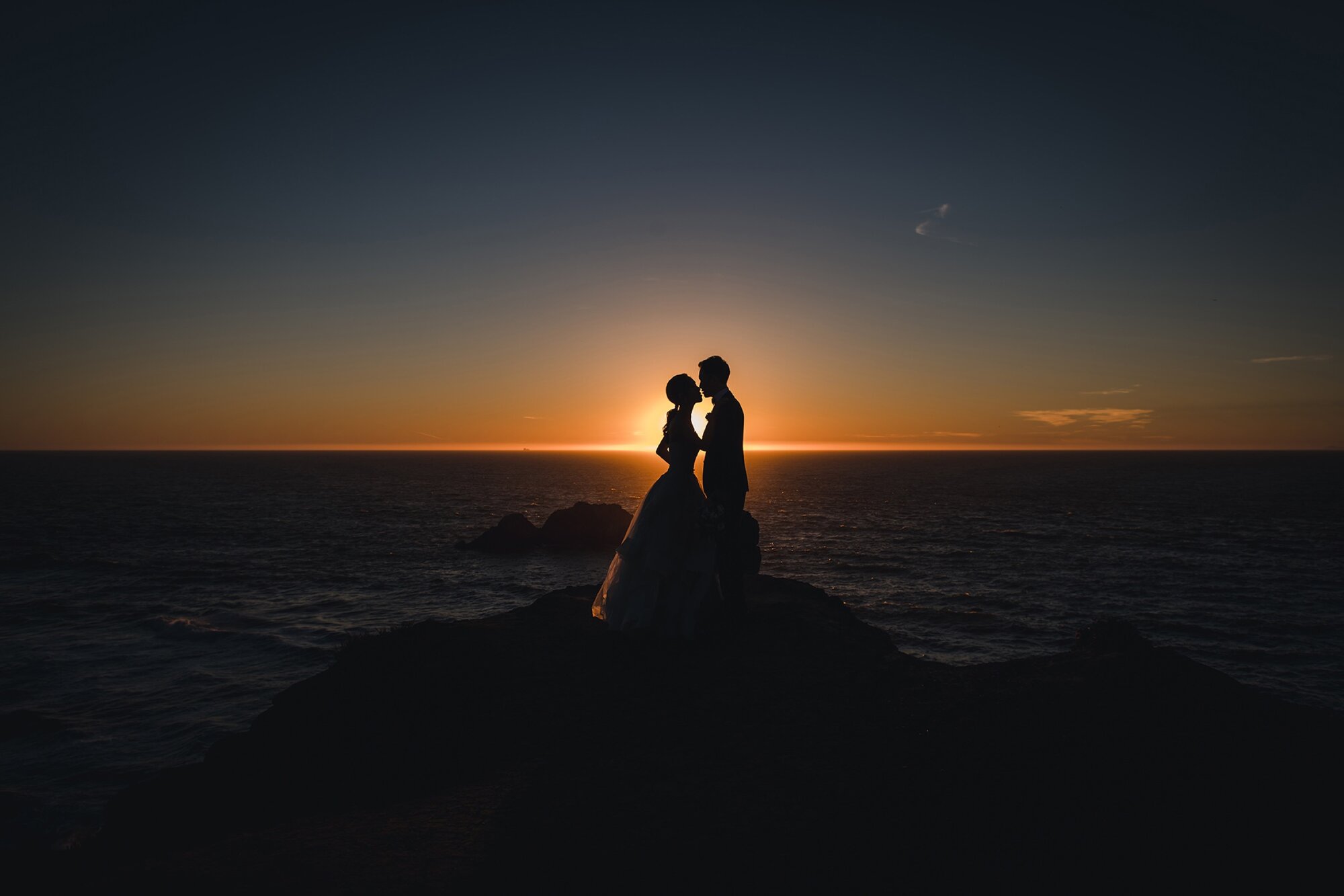 Sunset coastal wedding portrait